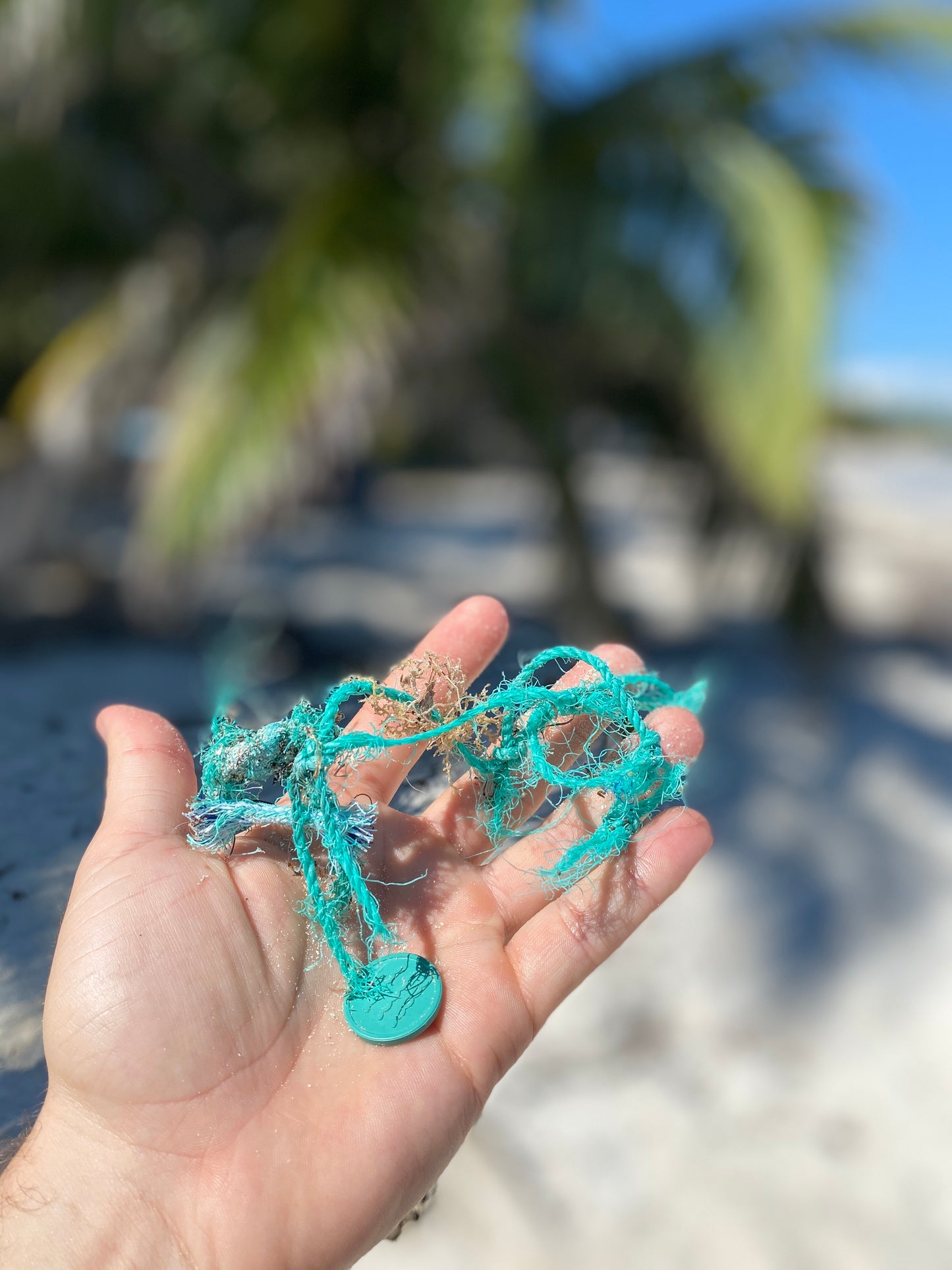 JM Band® pārstrādātu okeāna plastmasas žetonu fotoattēls. Iegādājieties 35 mm žetonus šeit.