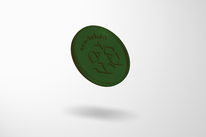 JM Band® noliktavā pieejamo bioloģiski noārdāmo plastmasas žetonu fotoattēls. Iegādājieties 23,25 mm (1 €) žetonus šeit.
