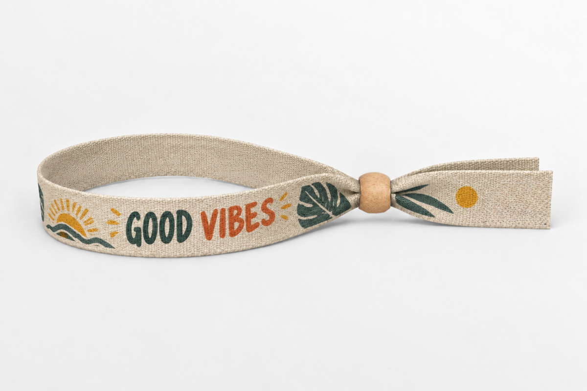 Bēša kokvilnas aproce ar krāsainu Good Vibes apdruku