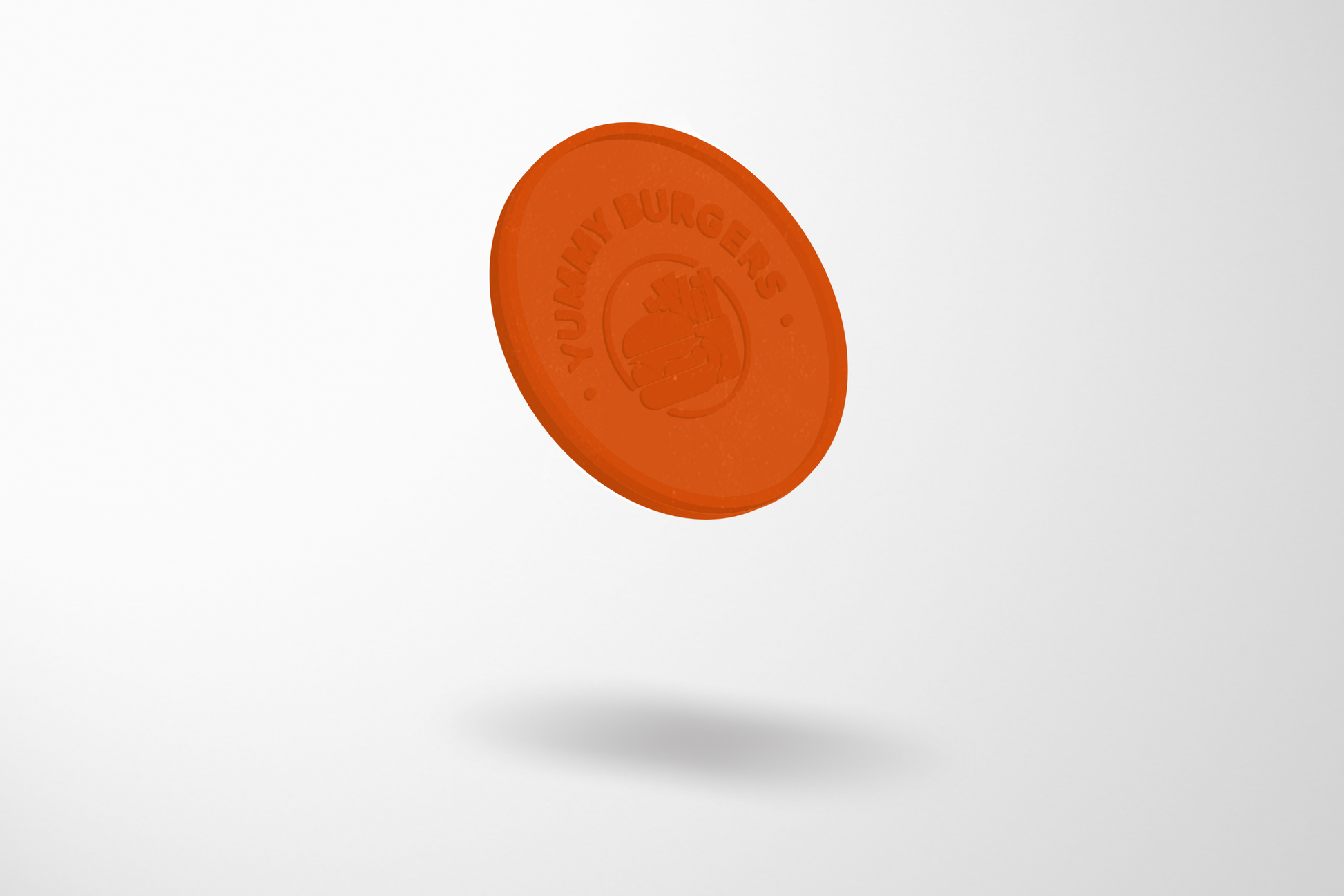 JM Band® reljefo plastmasas žetonu fotoattēls. Iegādājieties 23,30 mm žetonus šeit.