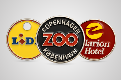Pielāgoti ratiņu žetoni ar JM Band® logotipu.