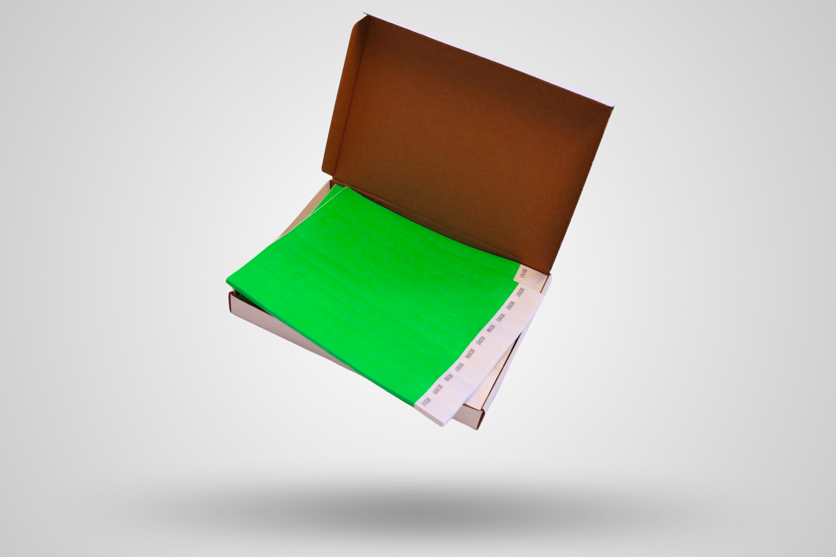 JM Band® papīra aproču (1000 gab. iepakojums) fotoattēls — vienkāršs materiāls. Iegādājieties zaļas papīra aproces šeit.